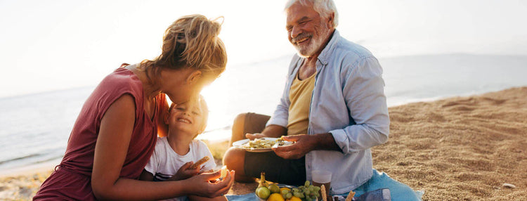 A family having a picnic at the beach