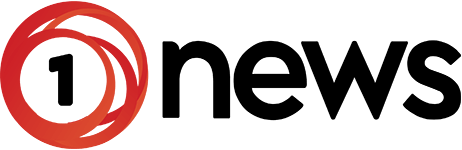 1News logo with a red ring around a white number 1 on the left and the word news in bold black lowercase letters to the right on a plain background
