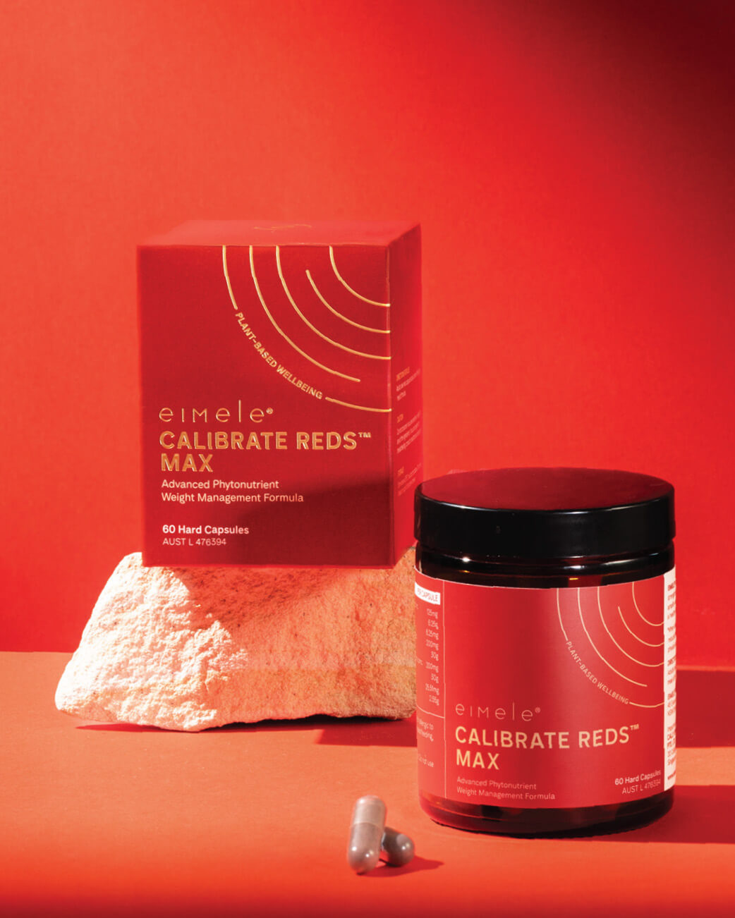 Red supplement container and packaging with 'eimele' branding on a red background.