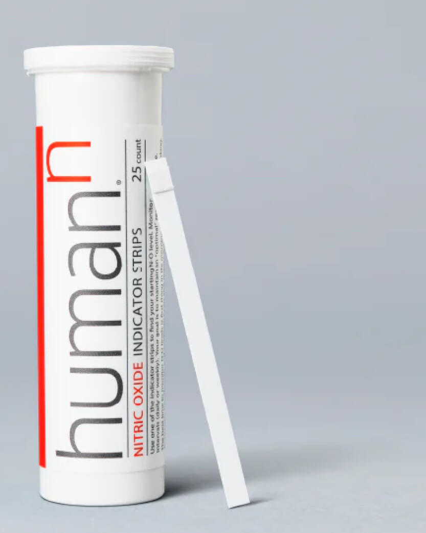 Nitric oxide indicator strips with 'humann' branding on a grey background.