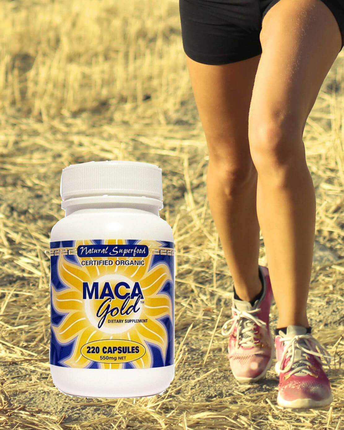 Maca Gold supplement bottle with a person standing in a field.