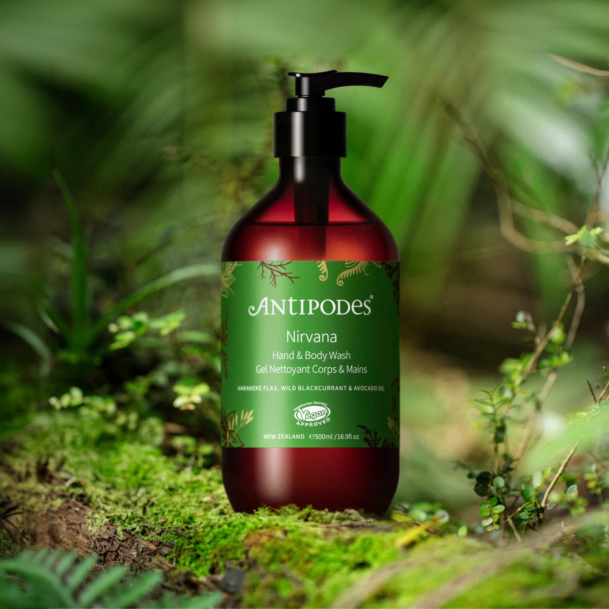 Antipodes Nirvana hand & body wash bottle in a natural setting