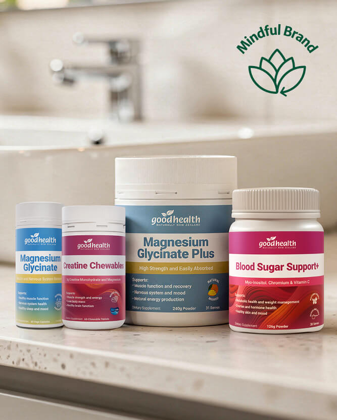 Goodhealth supplement bottles on a kitchen counter with 'Mindful Brand' logo.