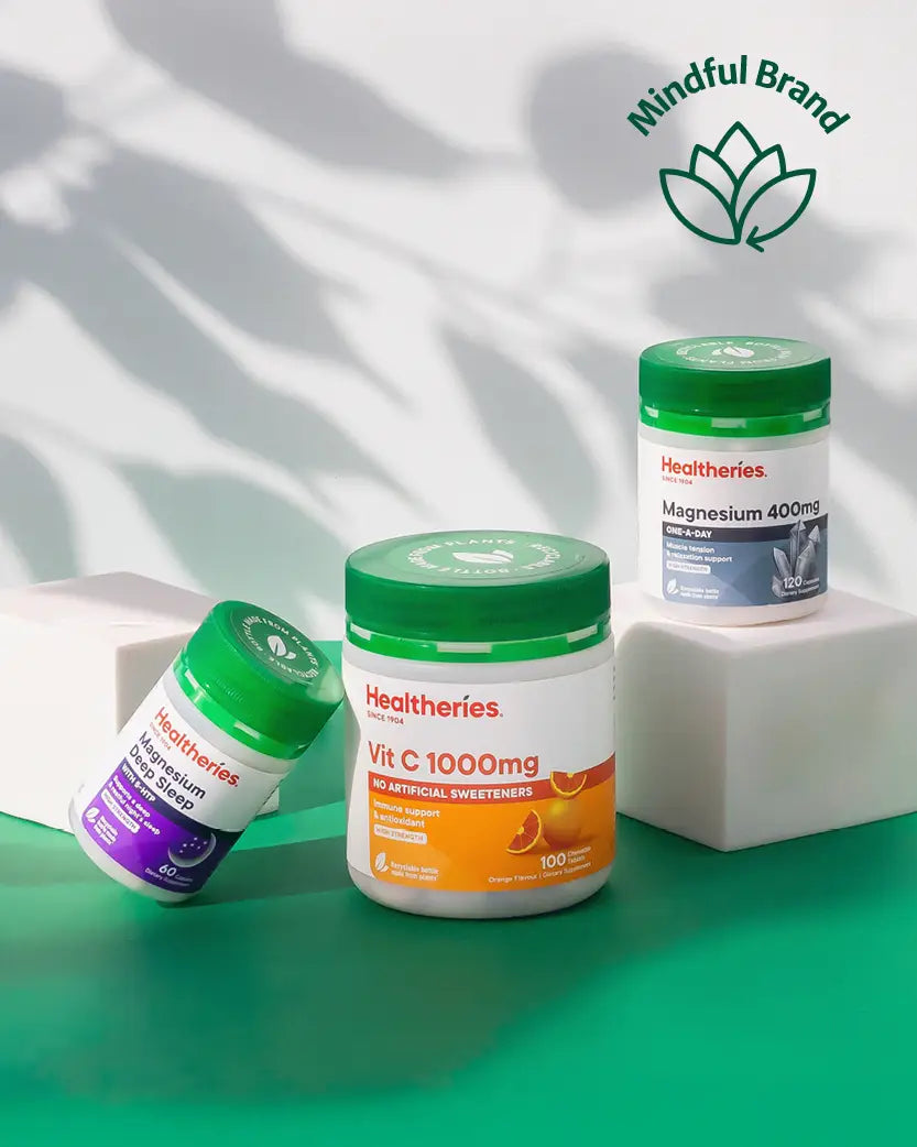 Healtheries supplement containers on a green surface with 'Mindful Brand' logo.