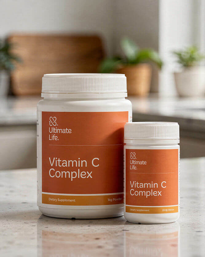Two bottles of Ultimate Life Vitamin C Complex on a kitchen counter.