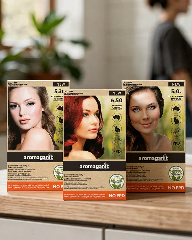 Three boxes of Aromaganic hair dye in 3 different shades.