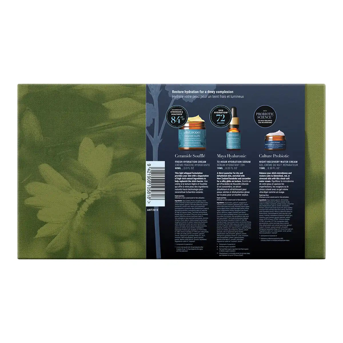 The back of a skincare product box shown against a white background. The box features a dark navy blue panel with product details, three illustrated bottles, and a green floral design on the left side.