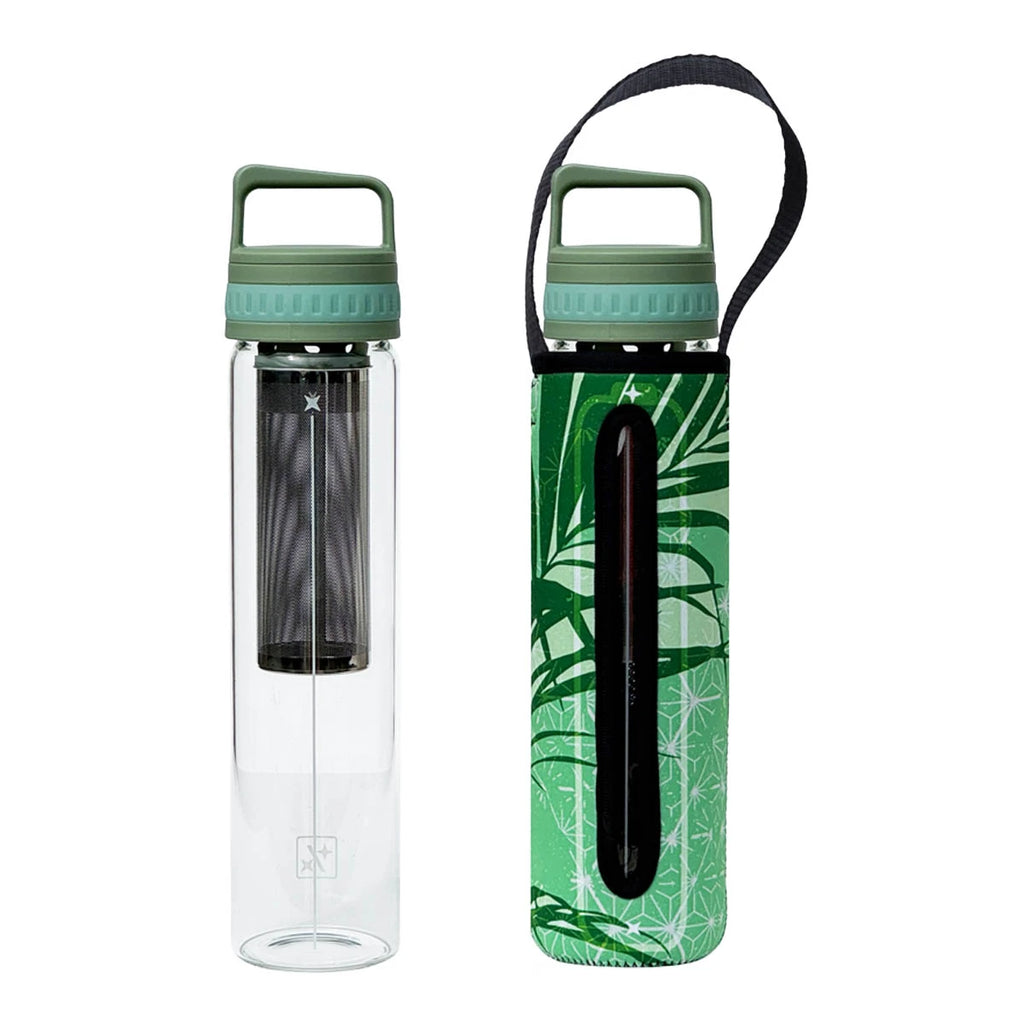 Two views of a reusable glass water bottle with a mint green lid and matching green tropical leaf-patterned carry case. 