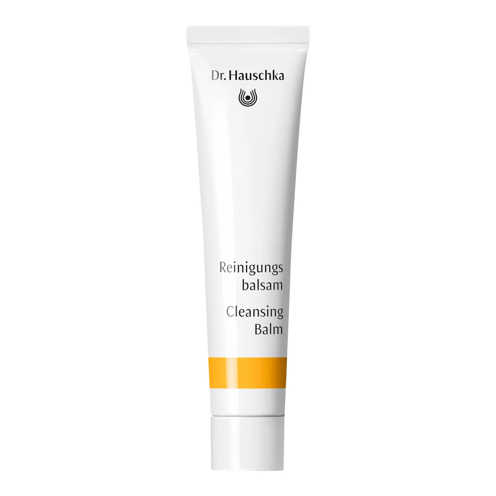 Dr Hauschka Cleansing Balm 20ml front view: white tube with an orange band at the base, shown upright on a plain white background