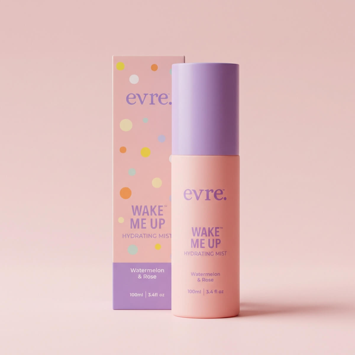 Evre Wake Me Up hydrating mist bottle and packaging on a pink background