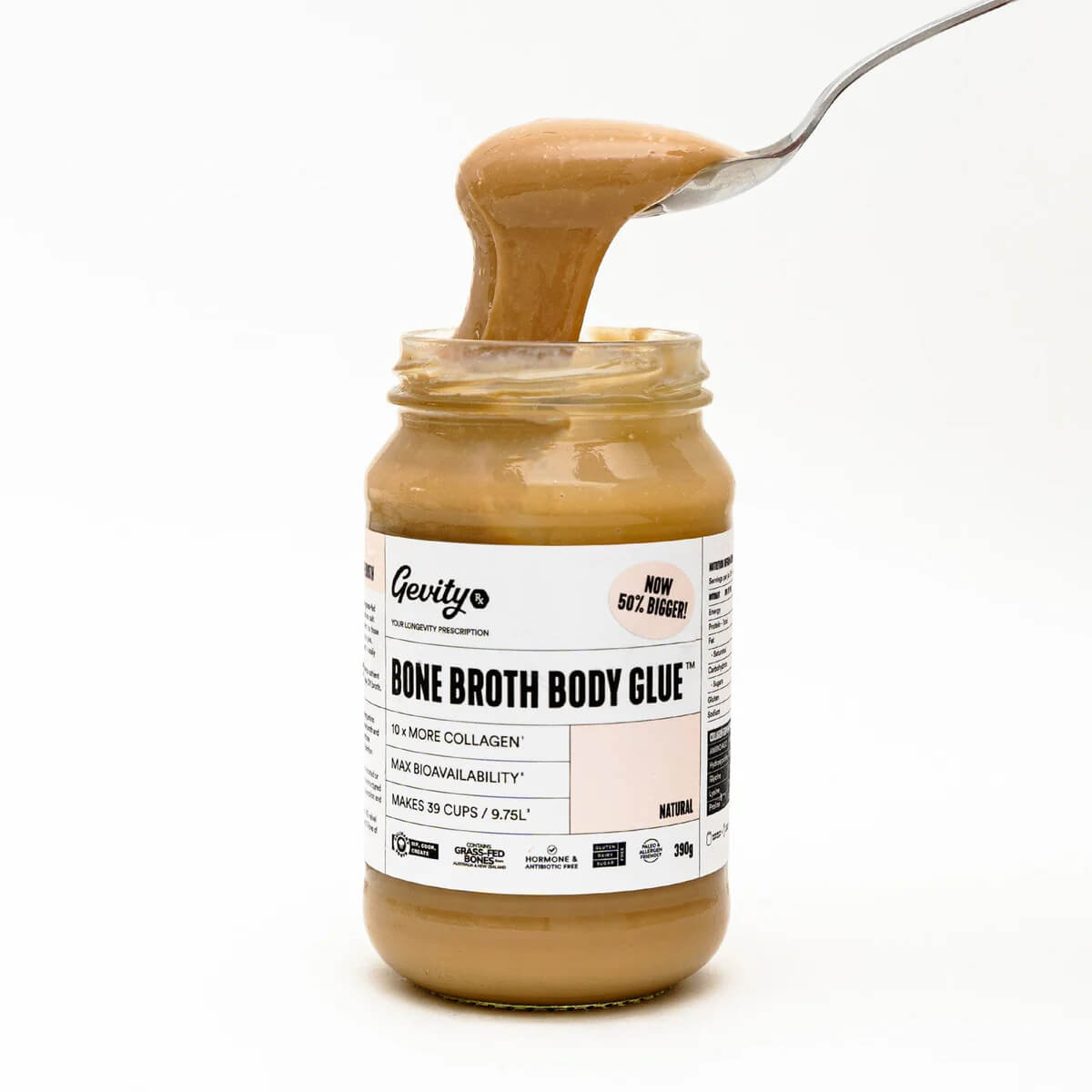 Jar of 'Bone Broth Body Glue' with a spoonful of product on a white background.