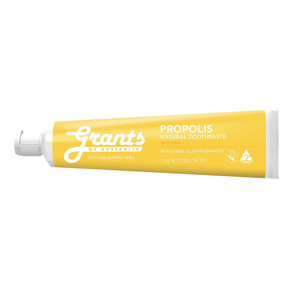 Yellow tube of Grants Propolis Natural Toothpaste on a white background.