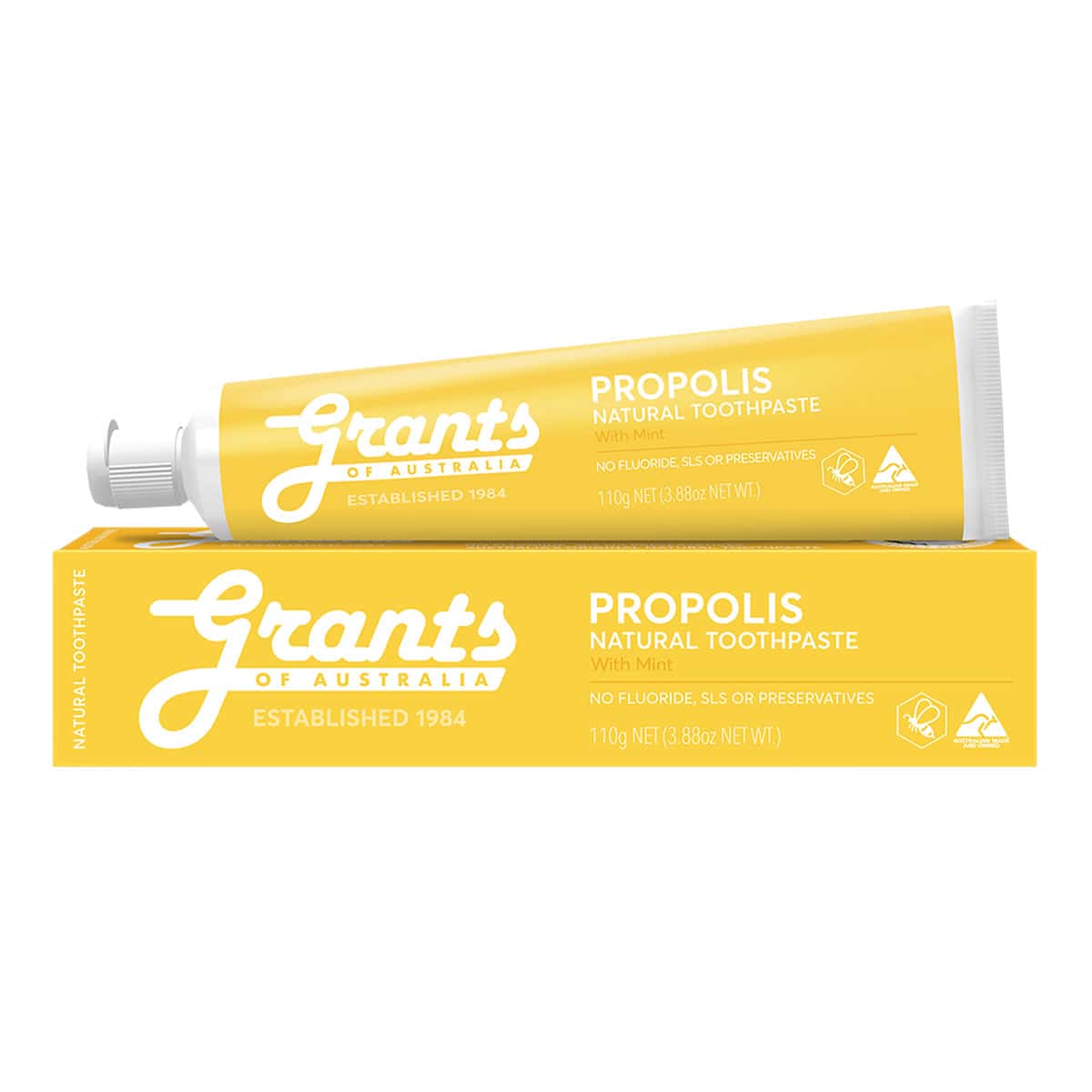 Yellow tube and packaging of Grants Propolis natural toothpaste on a white background.