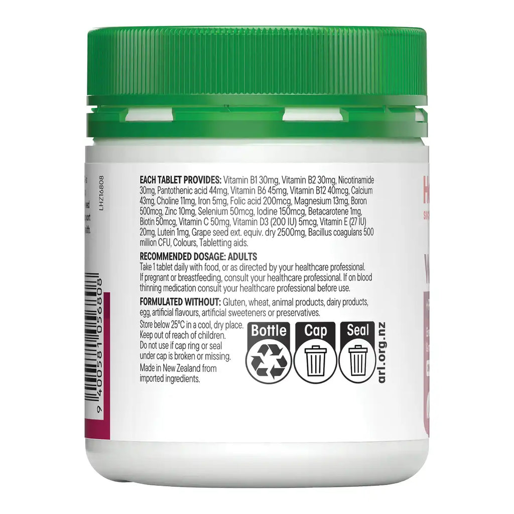 Back side of a white supplement bottle with a green cap, showing printed dosage information, ingredients, and recycling icons.