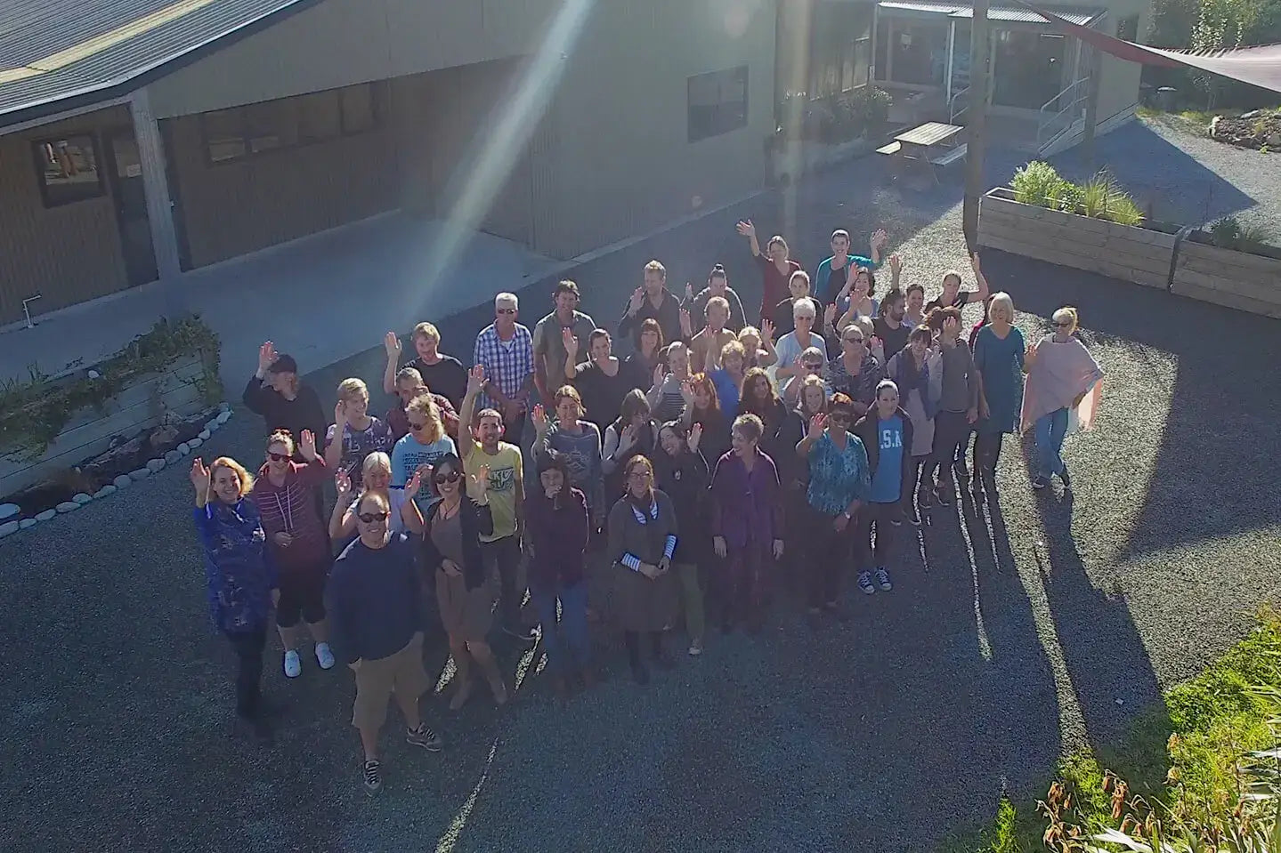 Team members outside building.