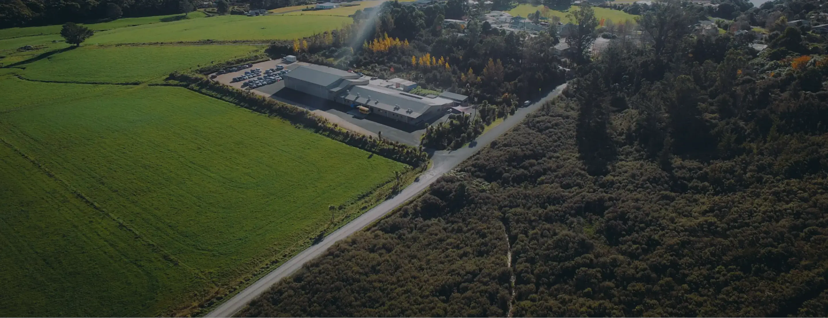 Aerial view of HealthPost warehouse surrounded by greenery.