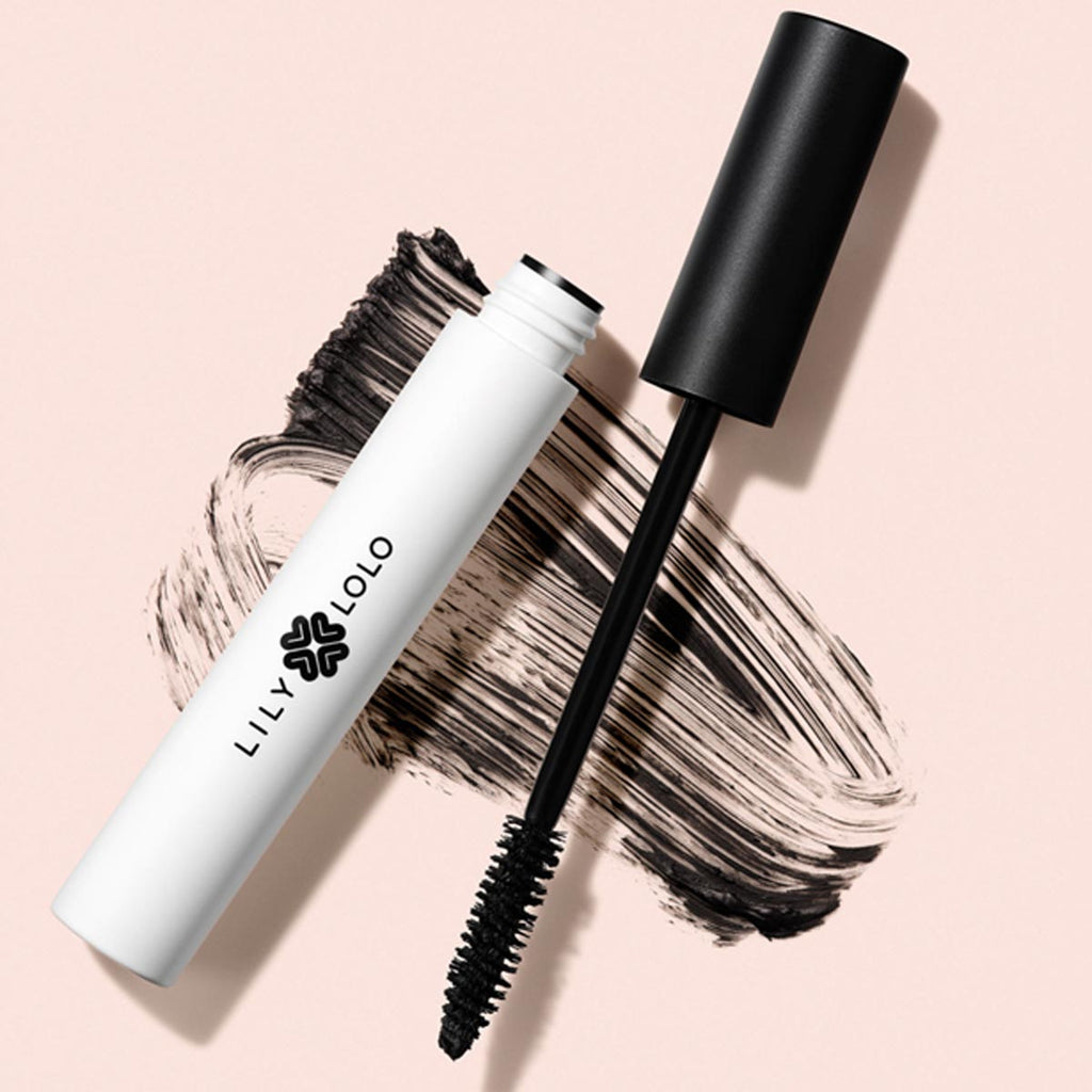 Lily Lolo mascara with wand on a pink background