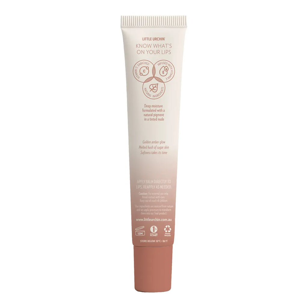 Back of tube of Little Urchin Lip Balm in the shade Brown Sugar, showing icons and text.