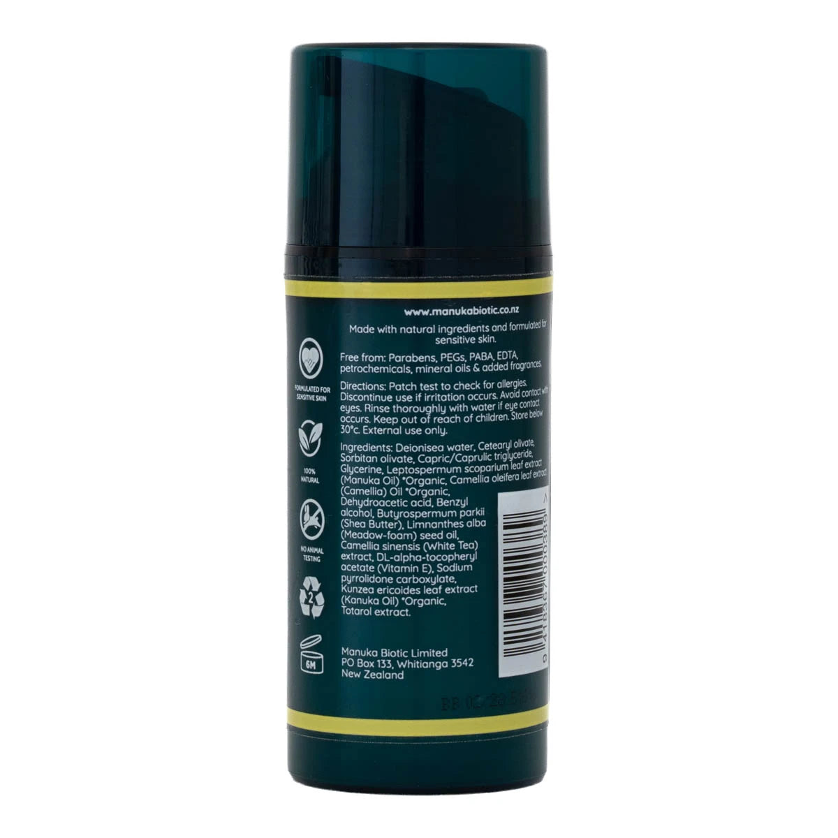 The back of a dark green cylindrical pump bottle, of light day cream for face. Showing ingredients, directions and other product information.