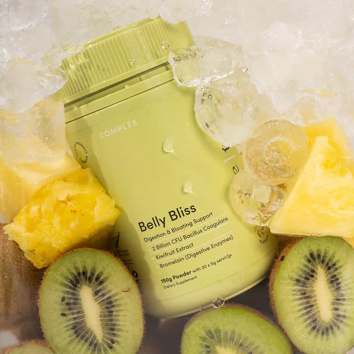 Belly Bliss supplement package surrounded by pineapple and kiwi slices with ice cubes.