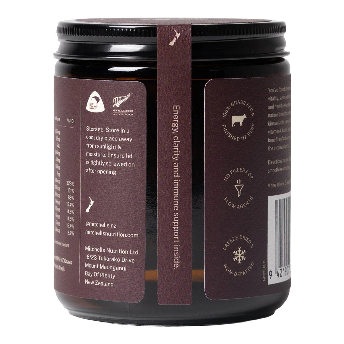 A dark brown jar of Mitchell Nutrition Turaxx with a black lid, showing the back and side labels with product information and icons.