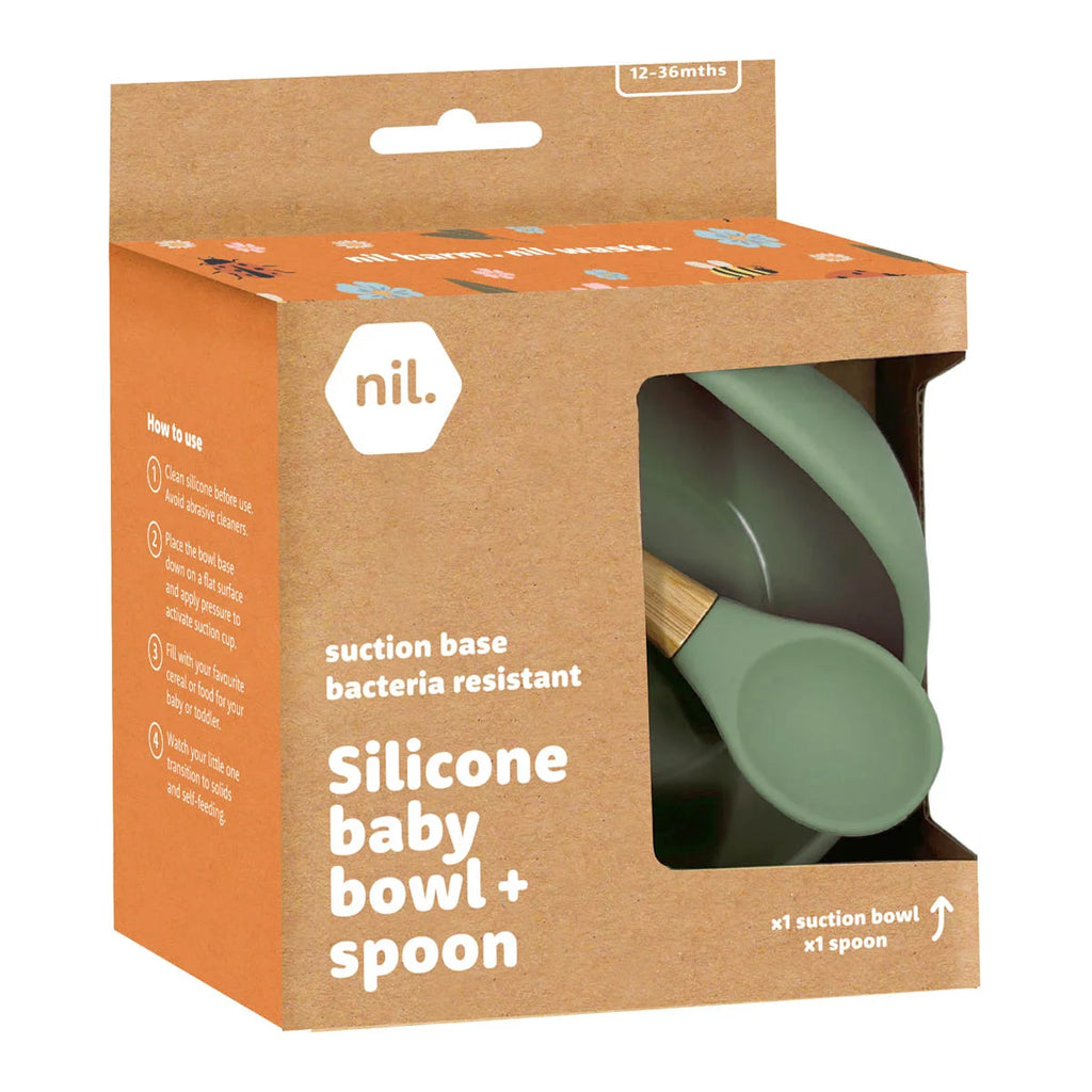 Nil Silicone Baby Bowl + Spoon with suction base, bacteria resistant. Shown in eco-friendly cardboard packaging.