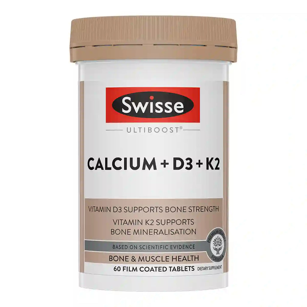 A white plastic bottle of Swisse Ultiboost Calcium + D3 + K2 dietary supplement with a beige cap and a white label.
