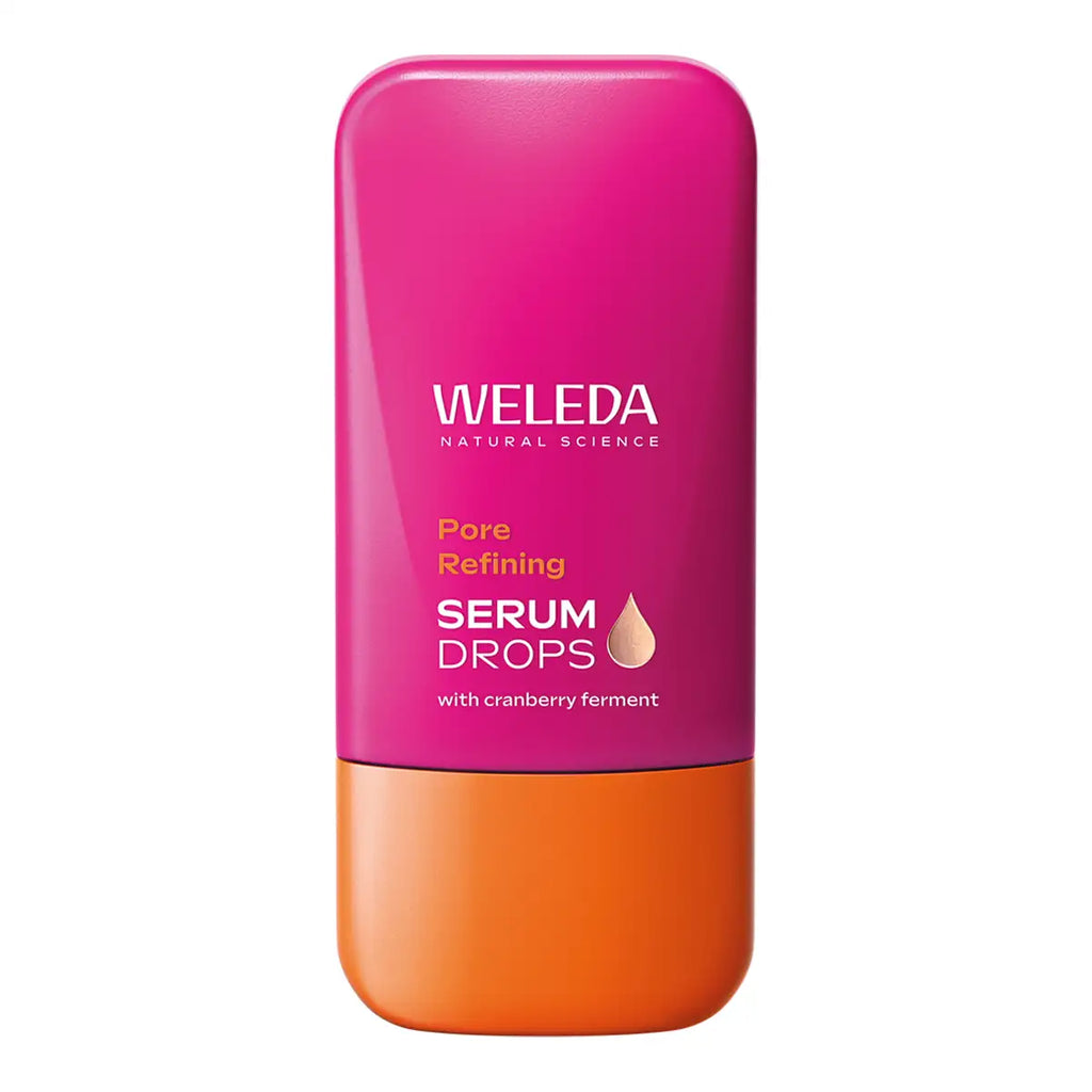 A bottle of Weleda Pore Refining Serum Drops, featuring a vibrant magenta-pink upper body and a bright orange lower base.